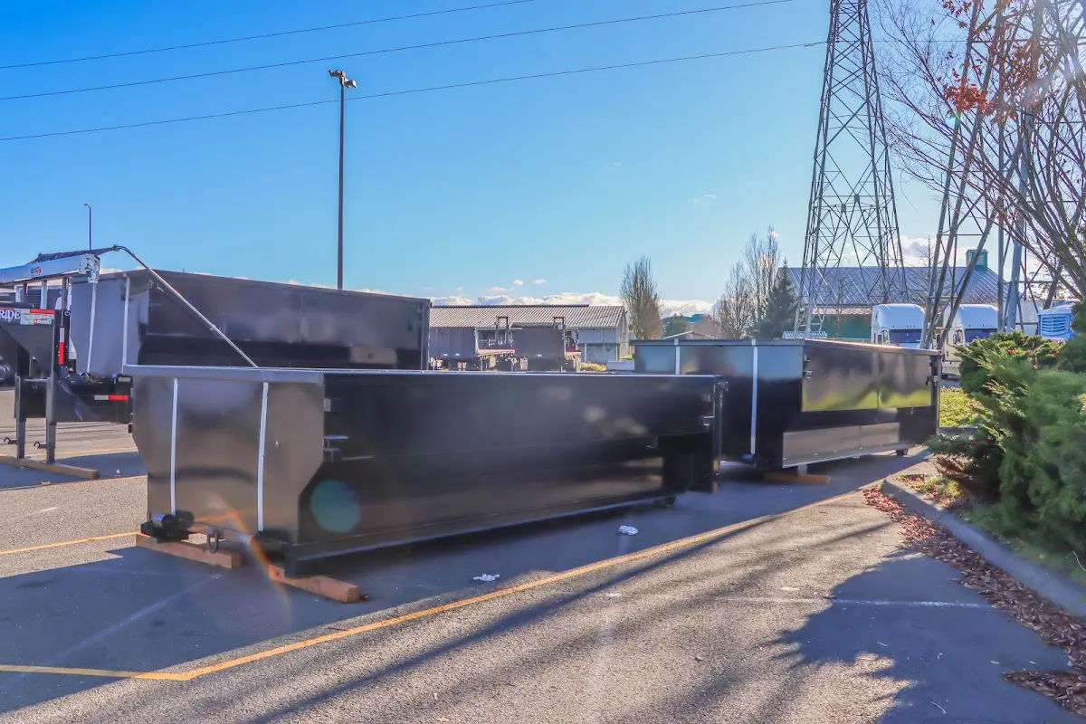 Roll-off dumpster ready for waste disposal at job site for Concrete Dumpster Rental in Coraopolis